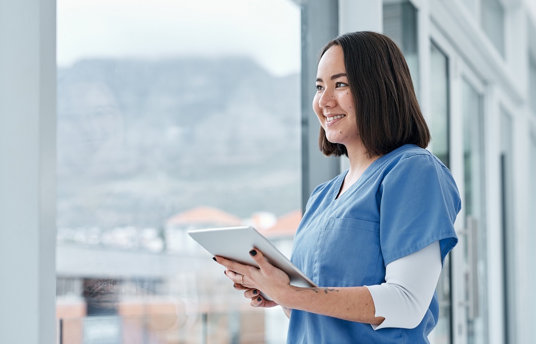 Shot of a medical practitioner using a digital tablet in a hospital.